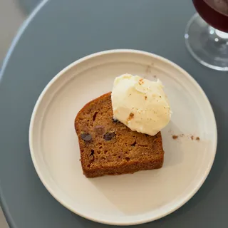 Instagram post: carrot cake with cream on a round plate